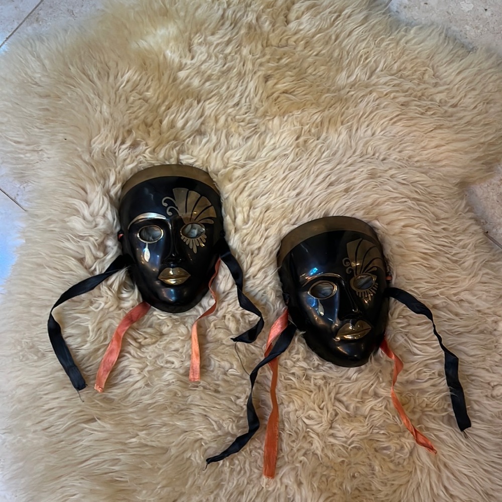 Set of two brass masks